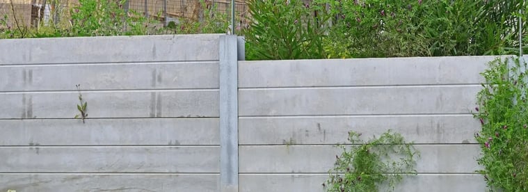 How a precast concrete sleeper retaining wall is built and specified