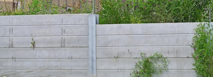 How a precast concrete sleeper retaining wall is built and specified