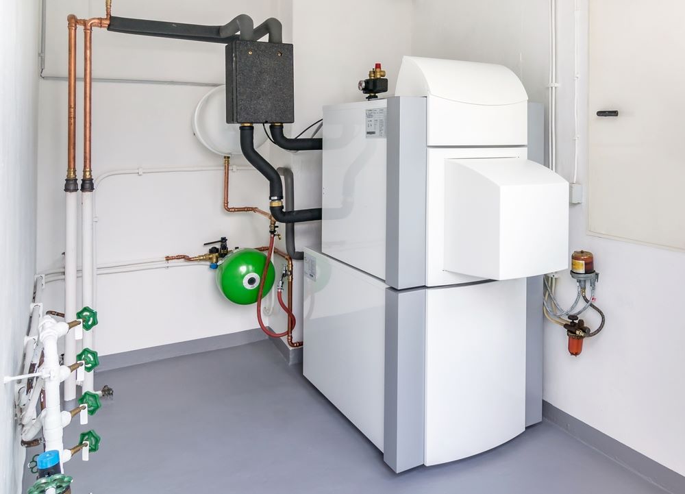 A domestic household boiler room with a new oil hot water heater design